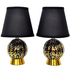 Pair of Hollywood Regency Black and Gold Table Lamps