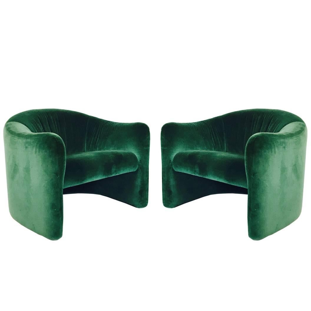 Four vintage green velvet armchairs by Metro. The velvet is in good vintage condition showing wear due to age of the pieces. 

Sold as pairs 

Dimensions: 31" W x 32" D x 26" T.
Seat height 16".
 