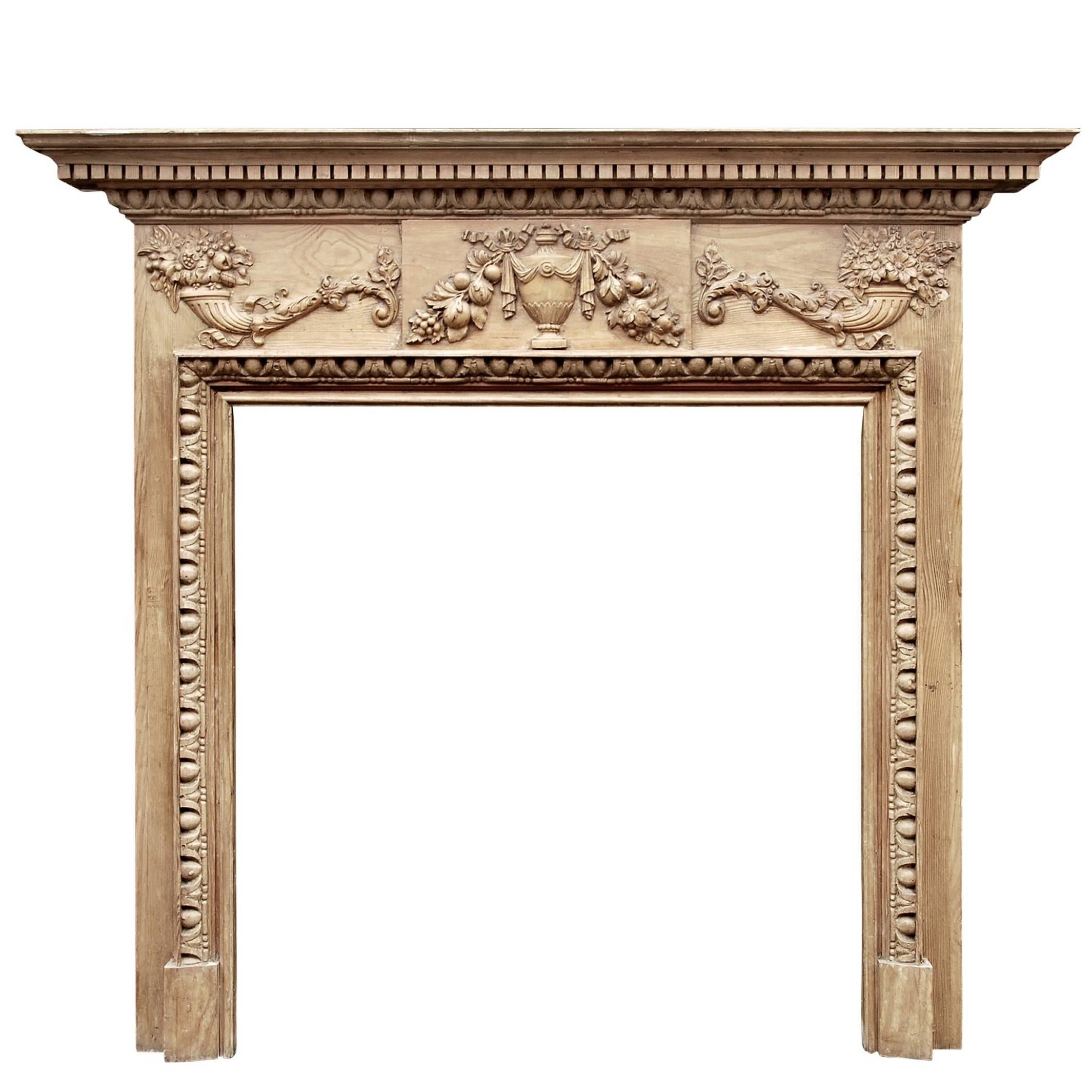 English Georgian Style Pine Fireplace with Gesso Enrichments For Sale