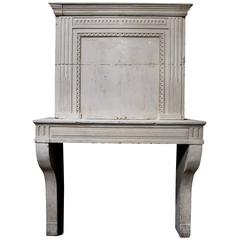 Late 18th Century French Louis XVI Limestone Fireplace with Trumeau 4