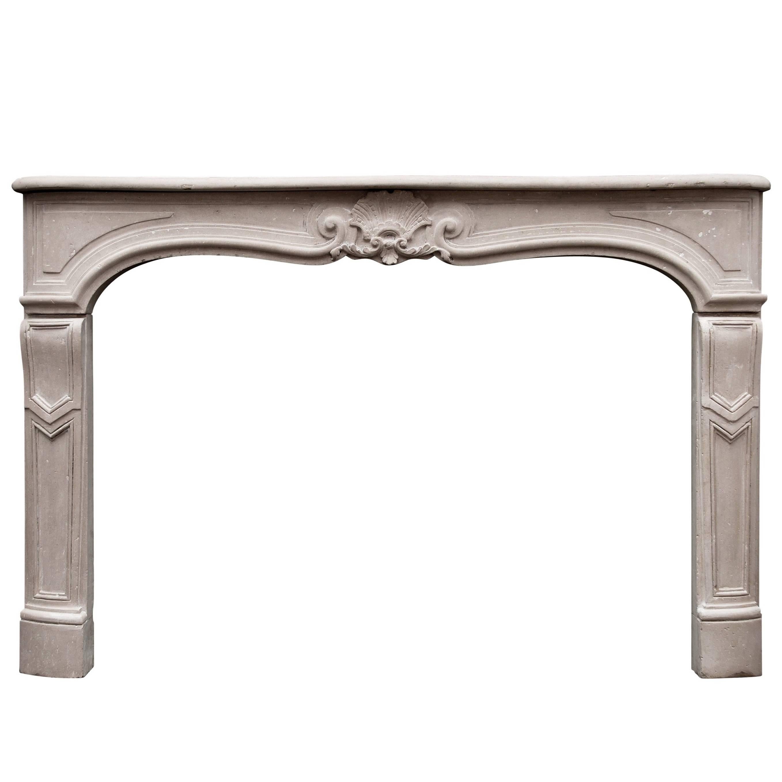 18th Century Louis XV Caen Stone Fireplace For Sale