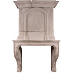 Early 18th Century Louis XIV Limestone Fireplace with Pannelled Trumeau 5