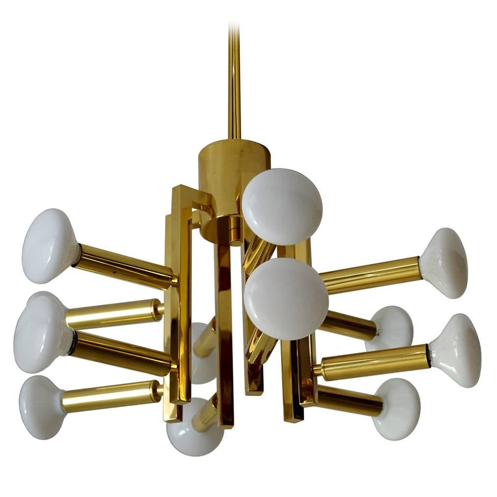 Beautiful twelve-arm modernist pedant or flush mount chandelier or pendant or flush mount, Italy, 1960s.

Measures: Diameter 15.7 inches (without bulbs).
Height of the body 11.5 inches.

 