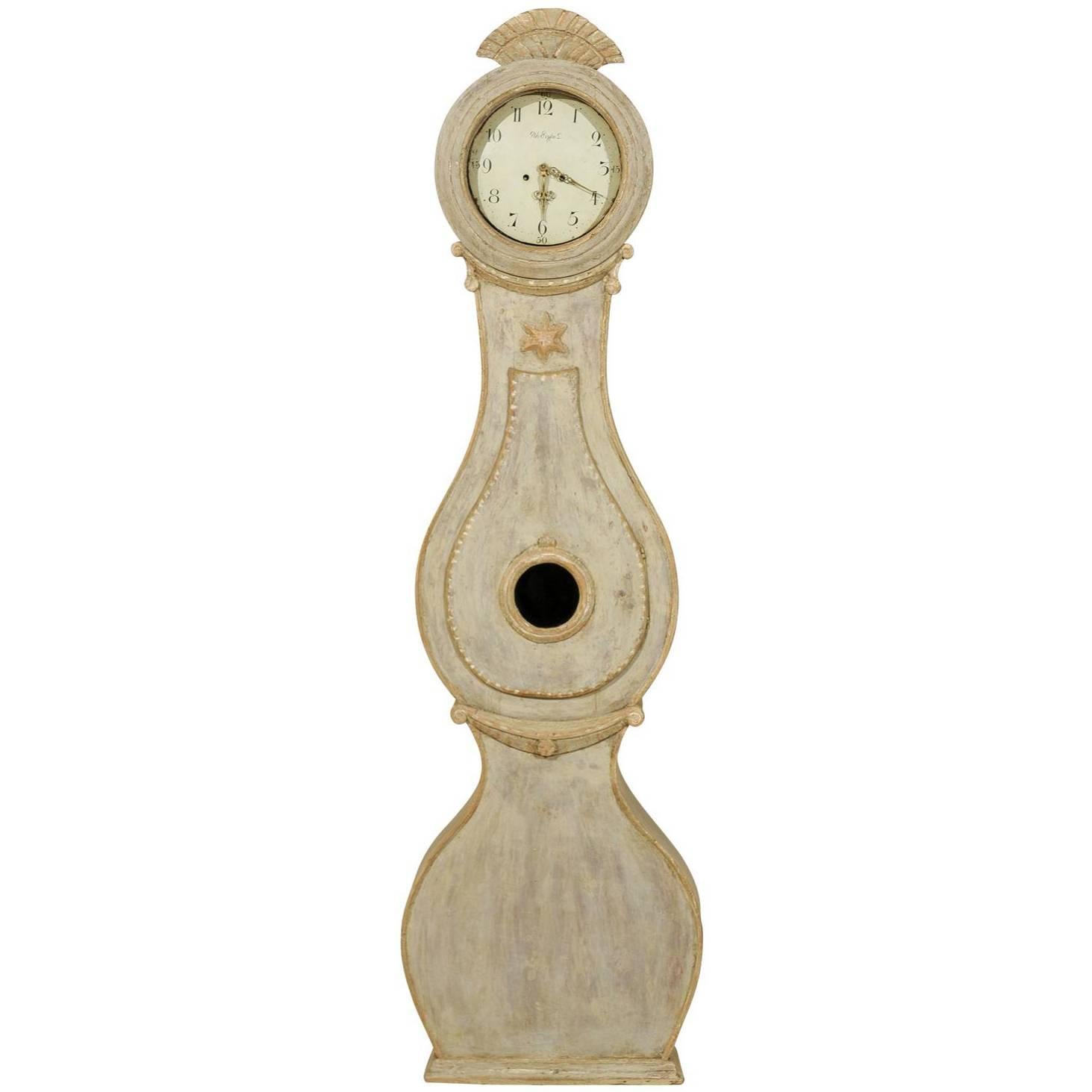 A 19th Century Swedish Fryksdahl Floor Clock with Carved Crest and Star Motif