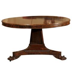 Antique 19th Century English Rosewood Center Table with Brass Inlay and Paw Feet