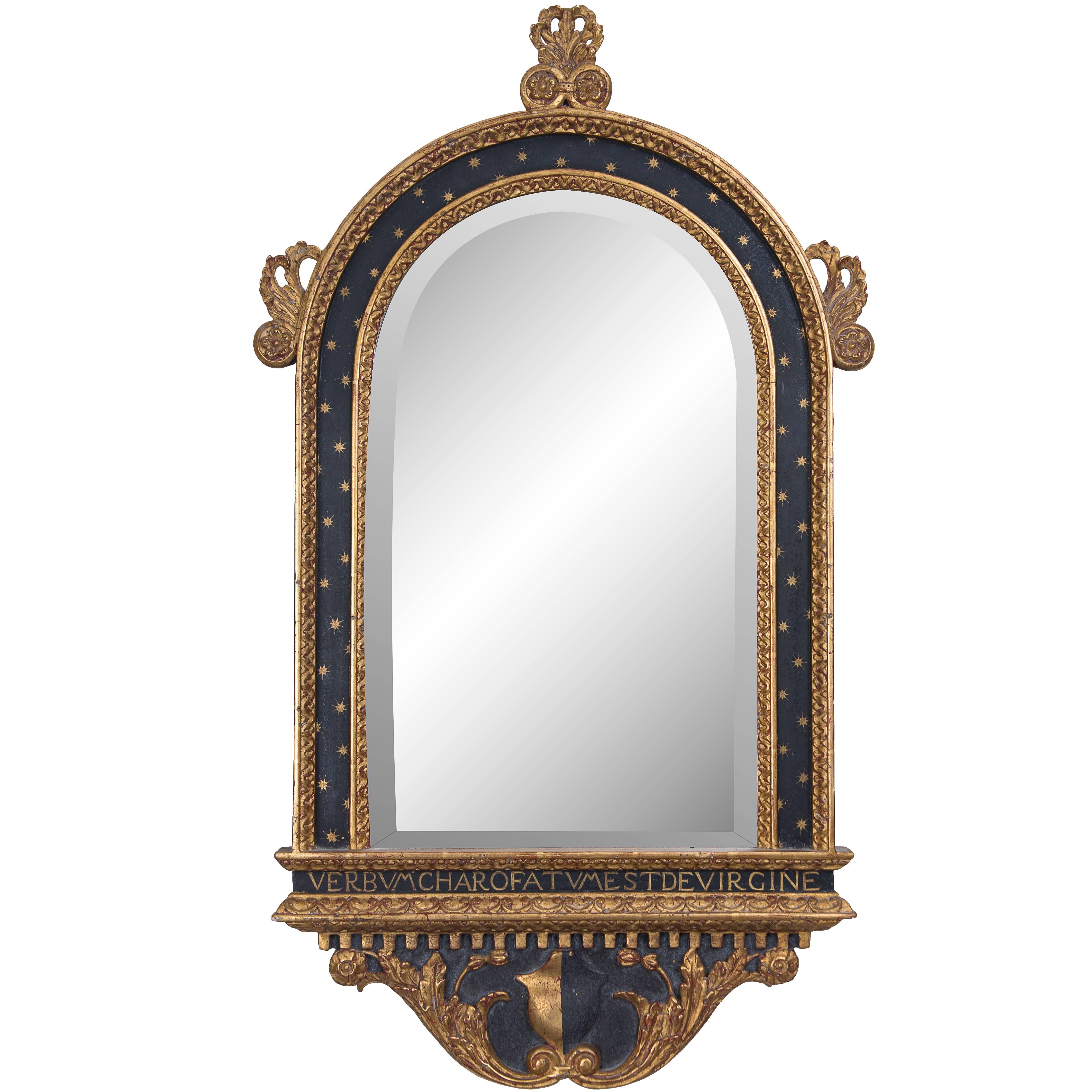 Italian Ebonized and a Parcel-Gilt Mirror