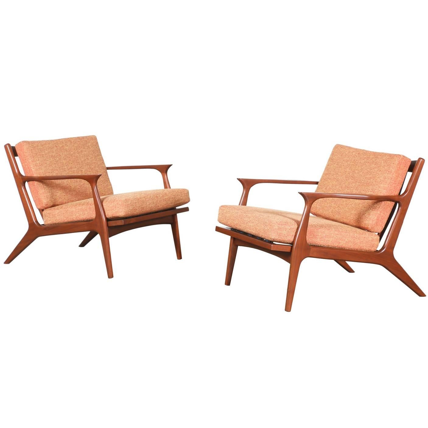 Pair of Mid-Century Sculpted Walnut Lounge Chairs