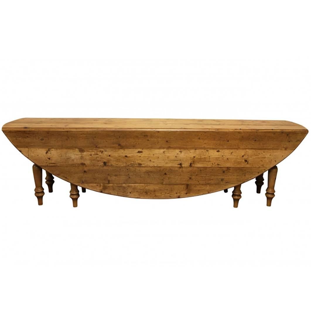 Massive Reclaimed Wood Oval Drop-Leaf Farm Table