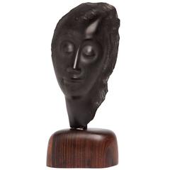 Jules 'J.S.' Vermeire, Art Deco Hard Stone Female Head on Mahogany Pedestal