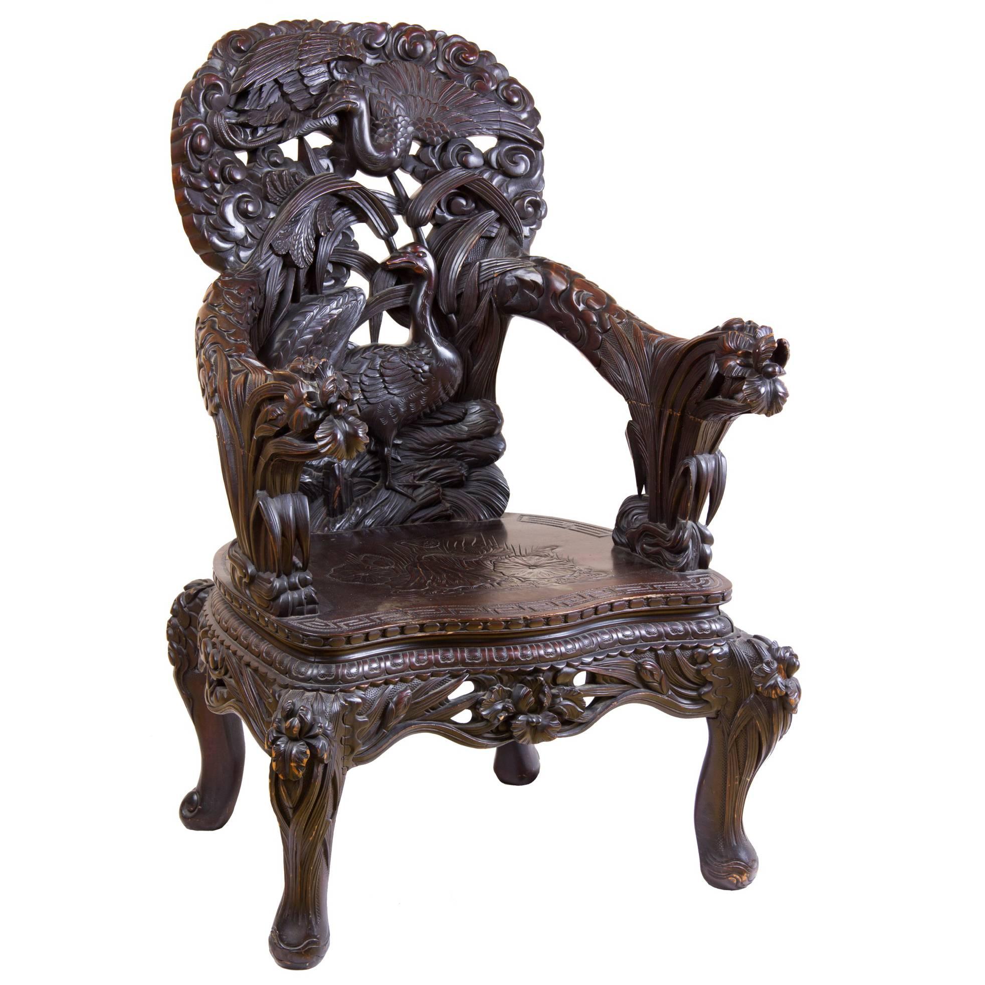 Exuberant Wood Armchair with Bird Motif and Floral Carving, Late 19th Century For Sale