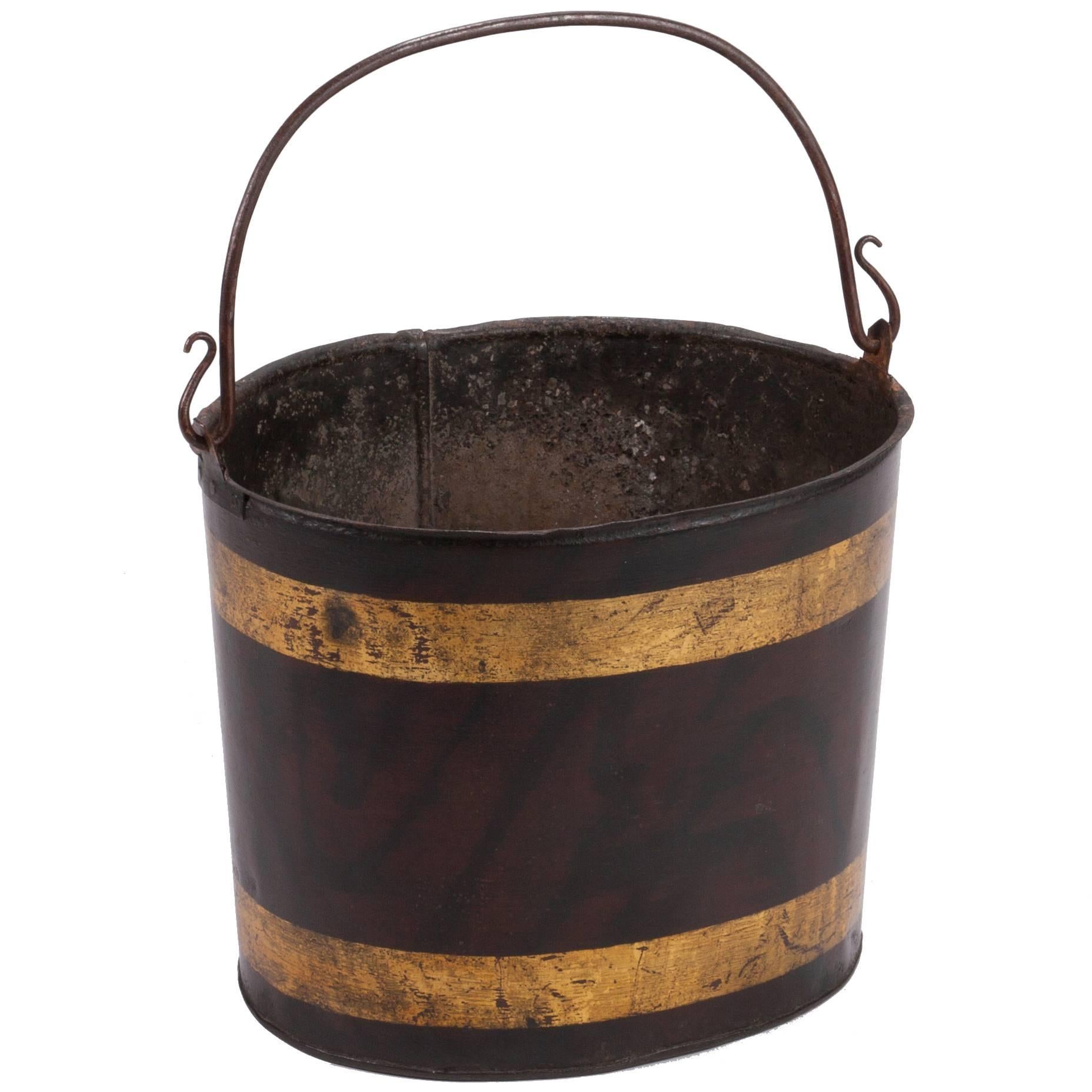 A Painted Metal Tole Bucket with Delicately Curved Handle