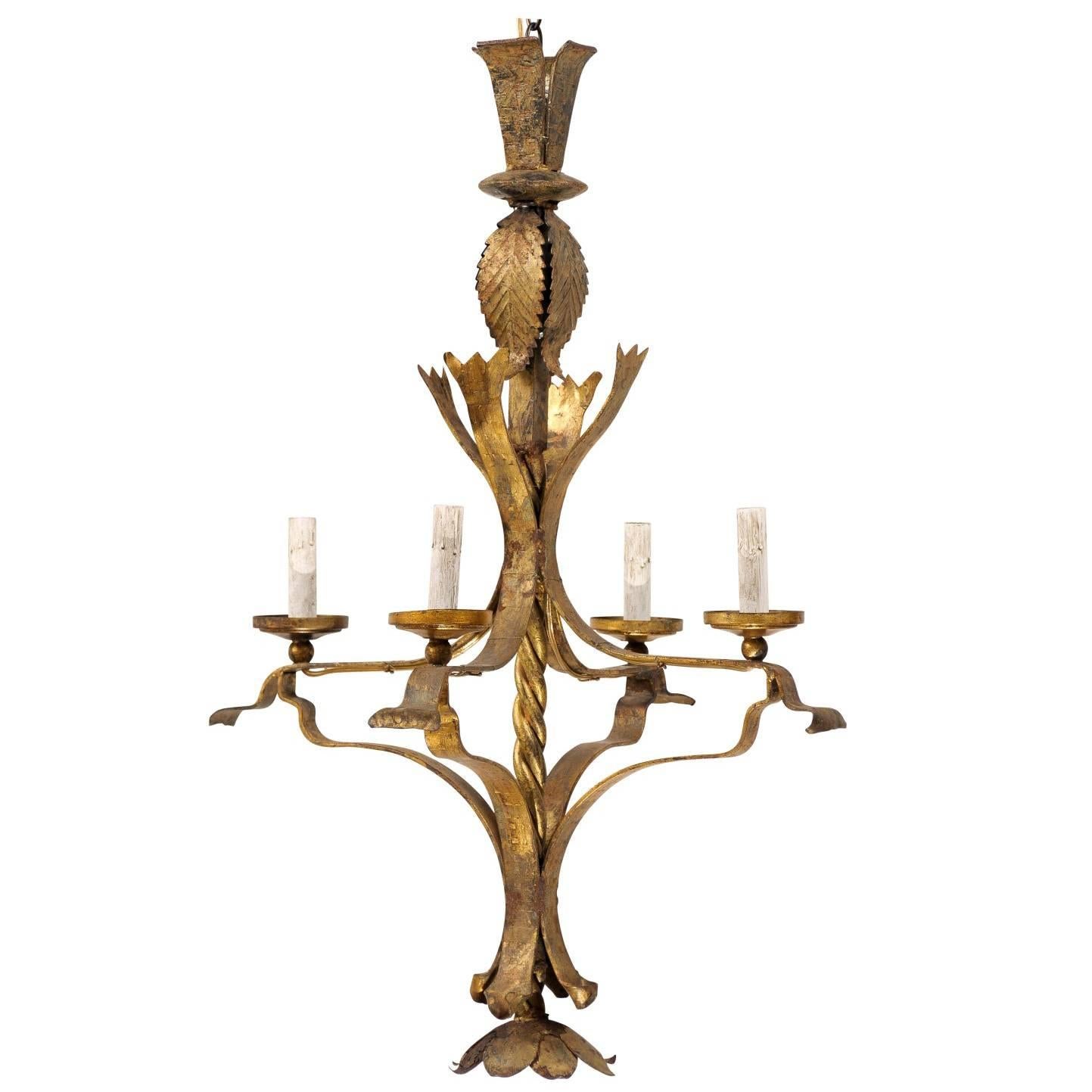 A French Vintage Gilt Iron Four-Light Chandelier with Floral Motif Finial