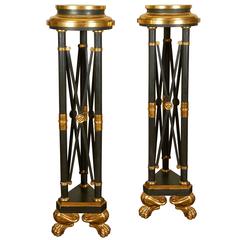 Pair of Hollywood Regency Black and Gilt Pedestals