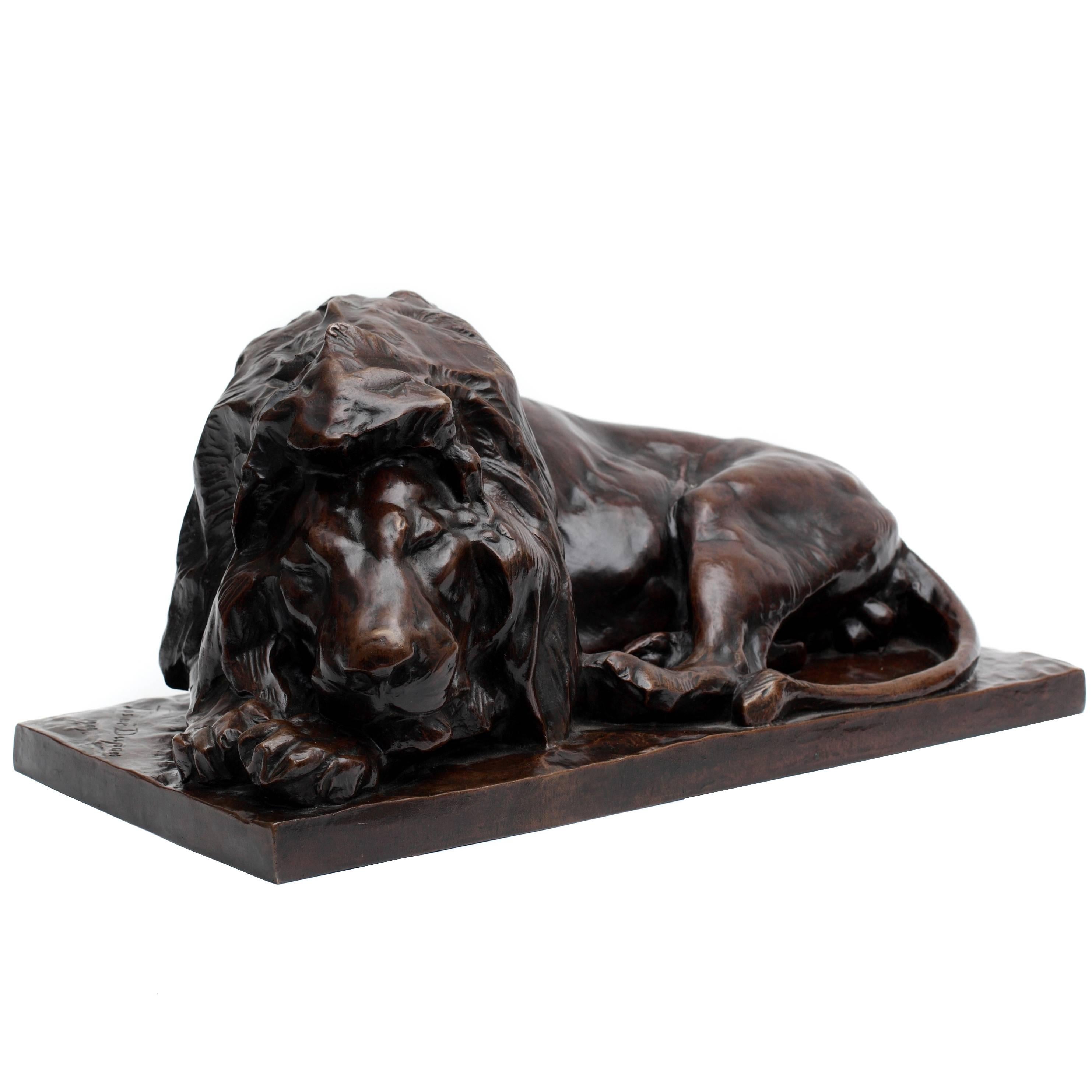 Reclining Lion Sculpture For Sale