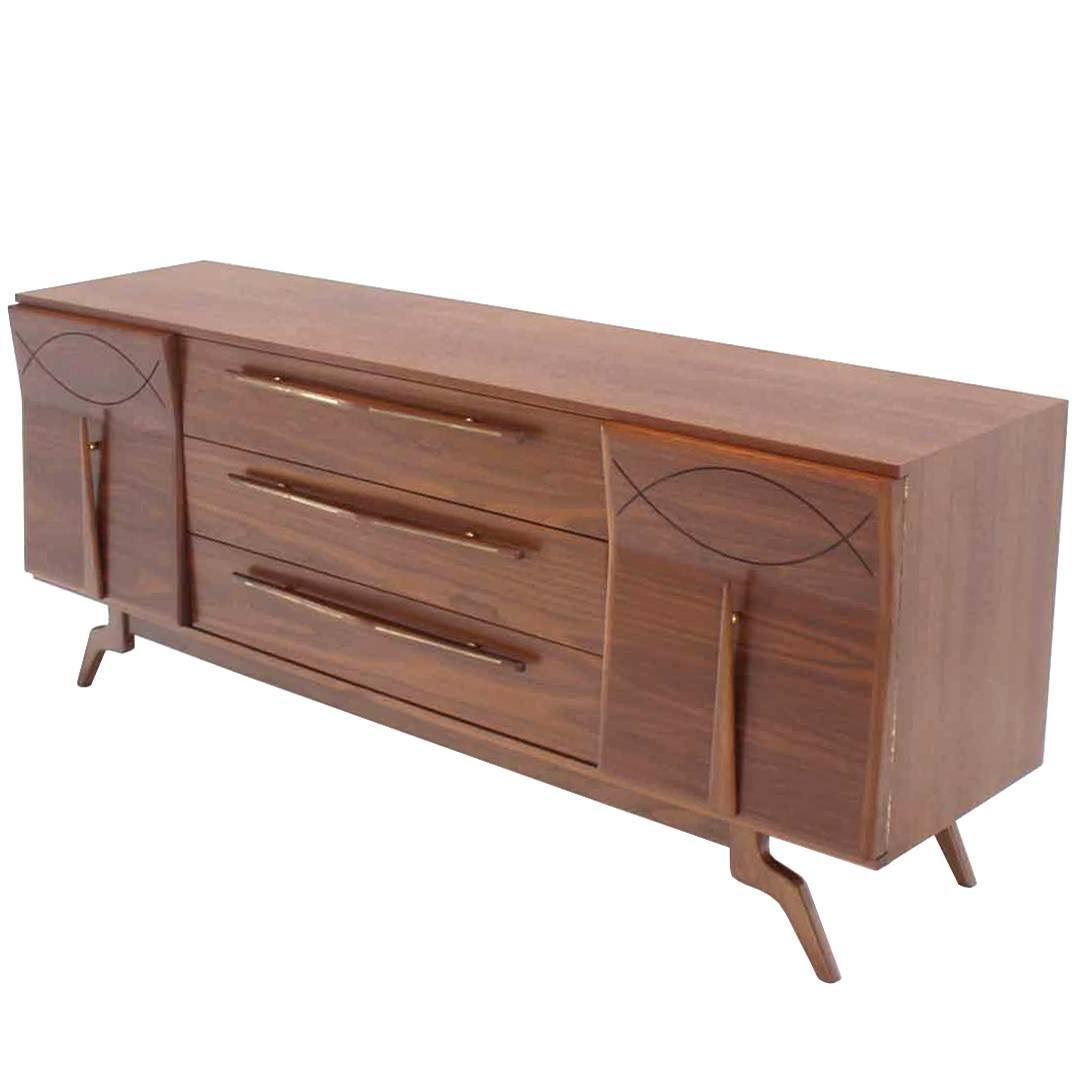 Outstanding Mid-Century Walnut Dresser with Heavy Sculptural Hardware For Sale