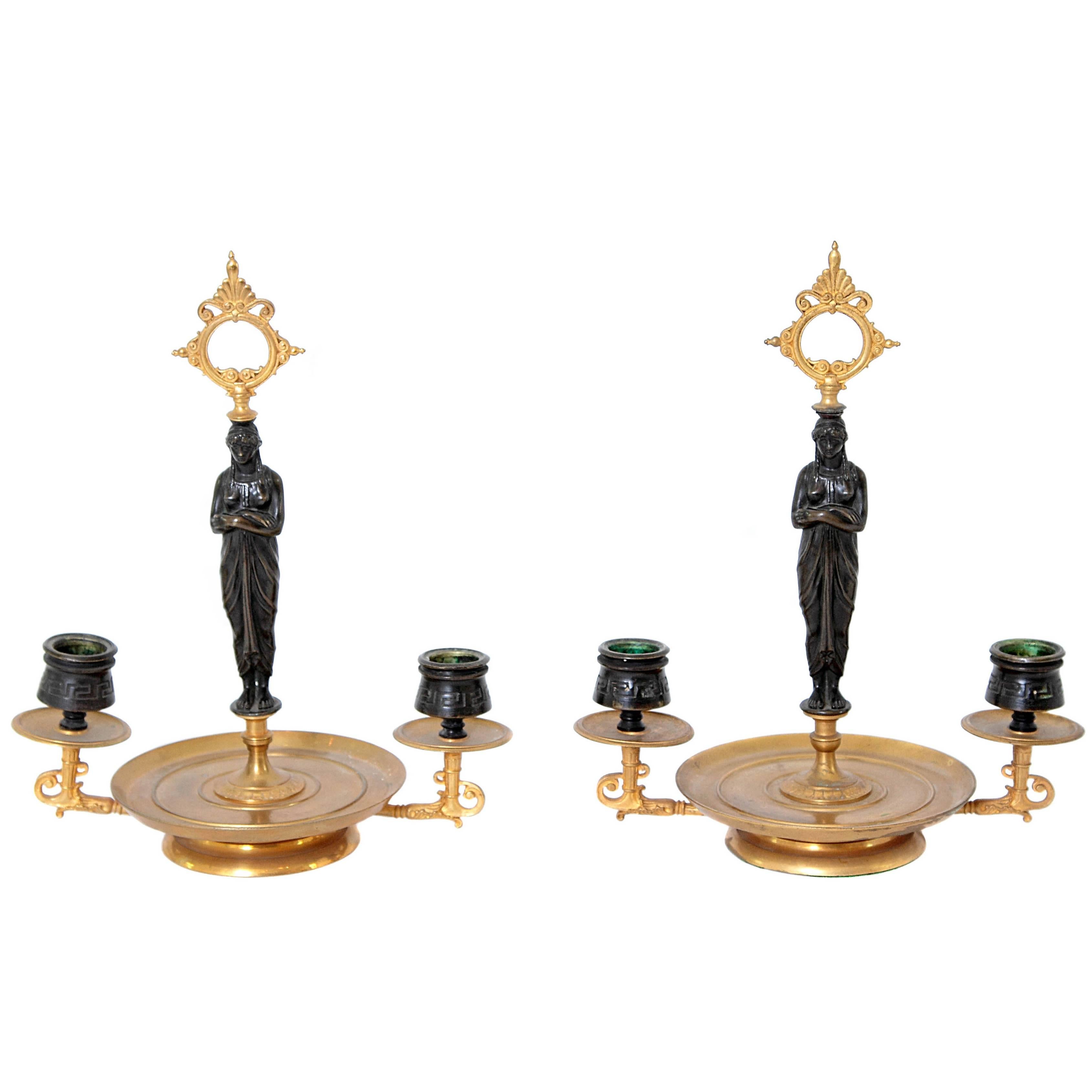 Pair of Patinated and Gilt Bronze Figural Candelabra For Sale