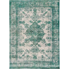 Siglo XX Alfombra antigua de lana persa con medallón verde teñida a mano