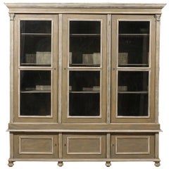 French 19th Century Wood Cabinet with Three Glass Doors Raised on Round Feet