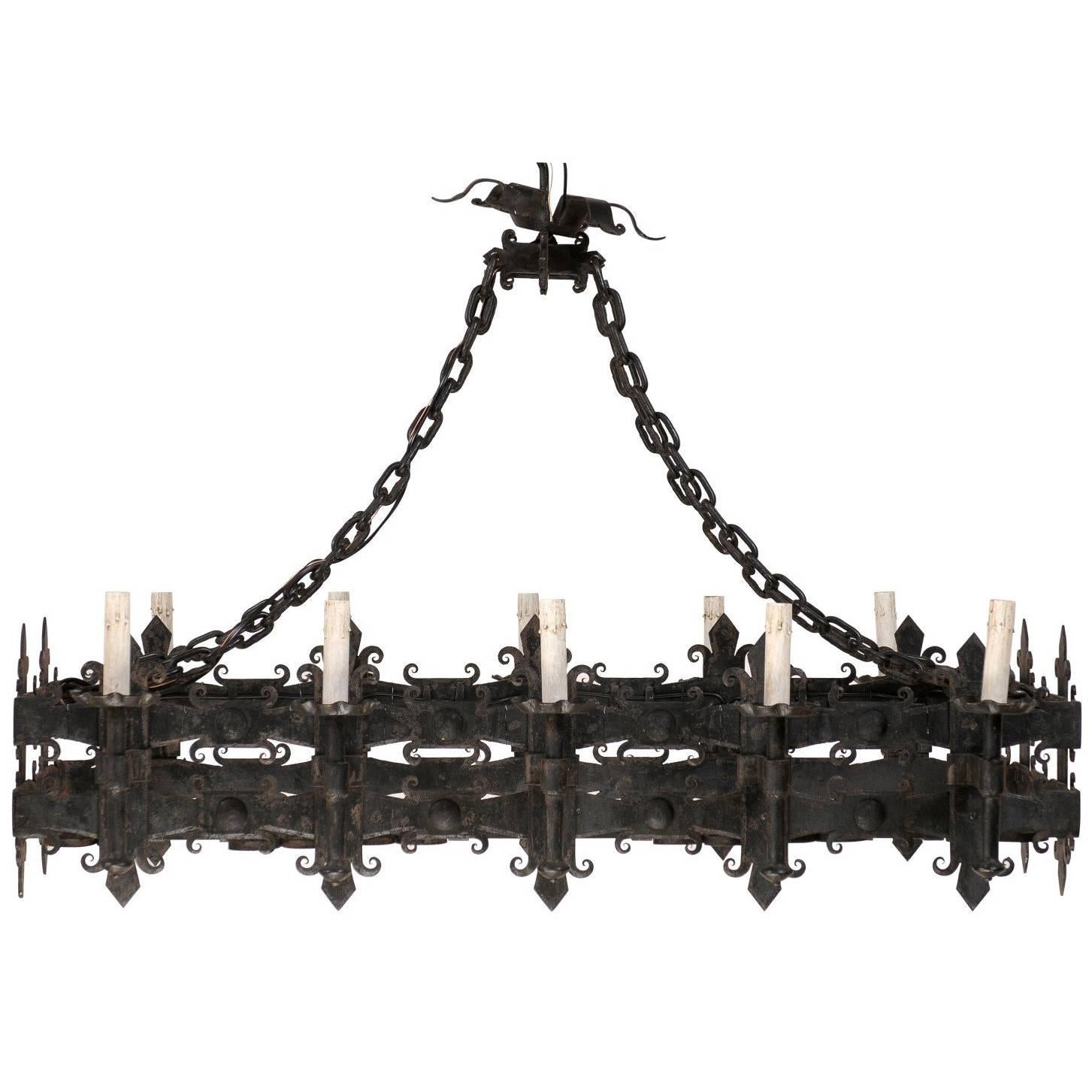 Italian Black Forged Iron Ten-Light Rectangular Chandelier, Fleur de Lys Motif For Sale