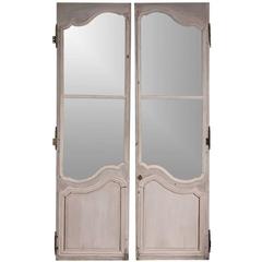 Pair of Distressed Highly Decorative 19th Century Armiore Doors