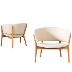 Nanna Ditzel Set of Two Lounge Chairs in Teak and Off-White Fabric