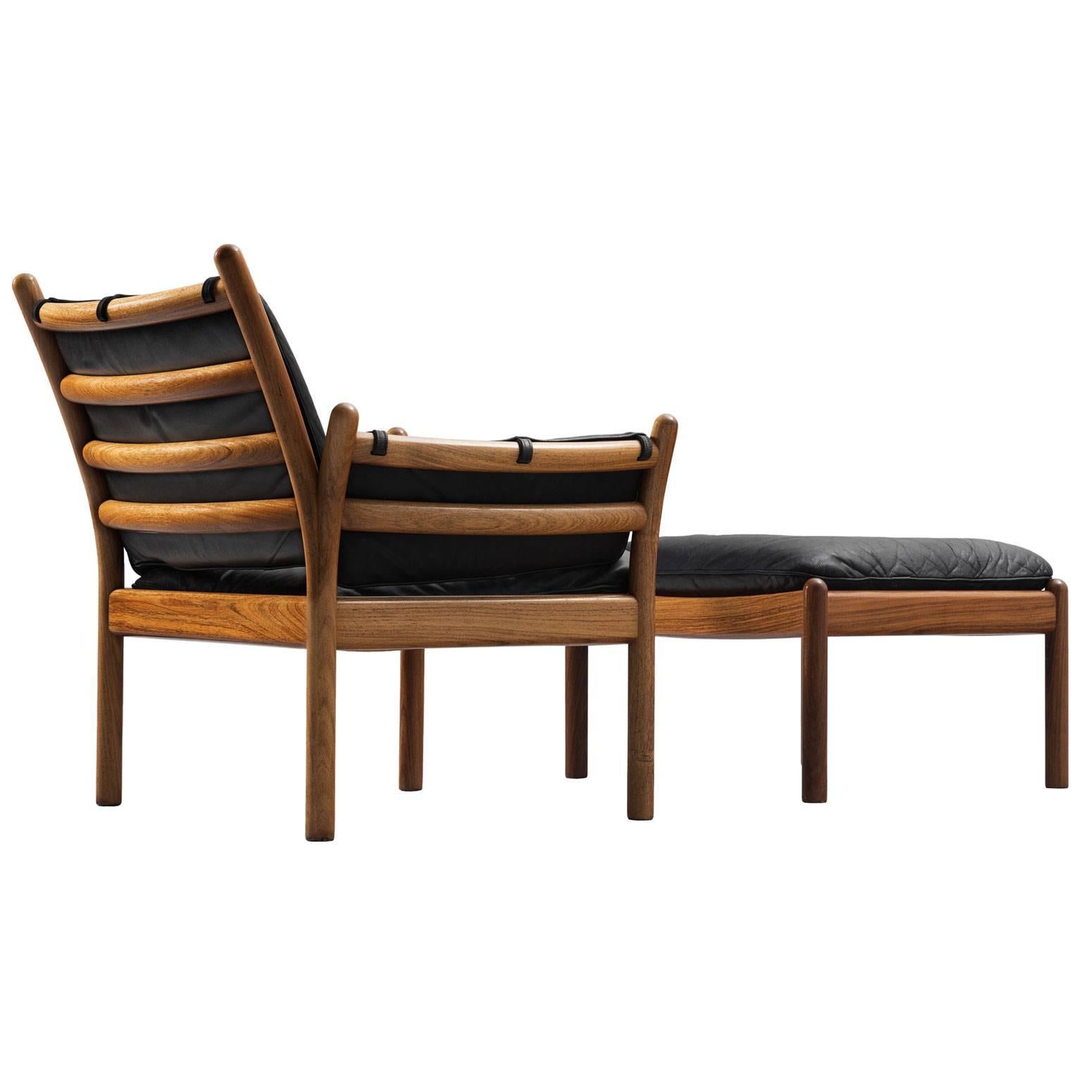 Illum Wikkelsø Solid Rosewood Lounge Chair and Ottoman