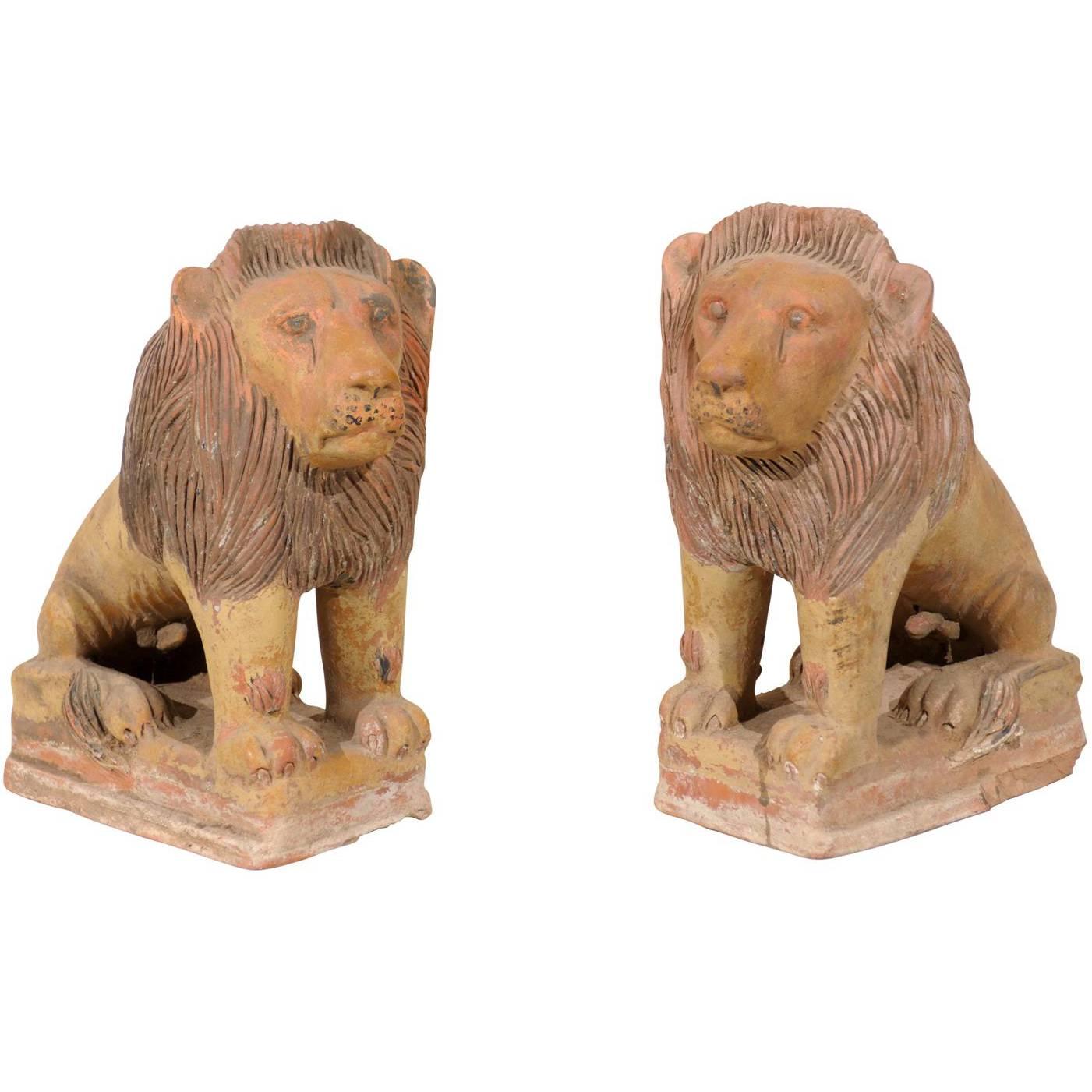 Pair of British Colonial Terracotta Lions For Sale