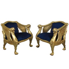 Regal Pair of French Giltwood Winged Bergeres