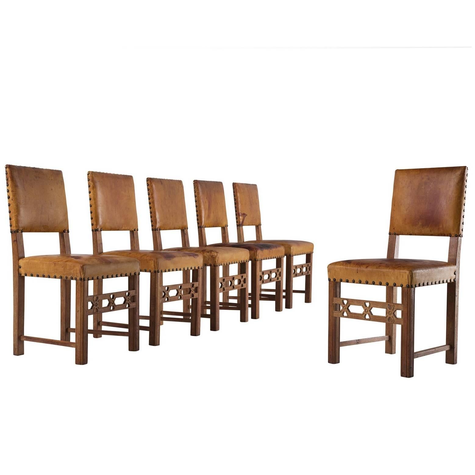 Set of Six Swedish Dining Chairs in Oak and Patinated Cognac Leather