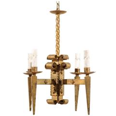 French Vintage Four-Light Chandelier with Torch-Shaped Arms, 20th Century