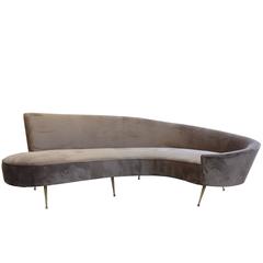 Italian Curved Sofa, New Upholstery and Small Typical Brass Legs