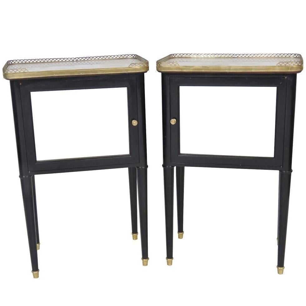 Pair of Jansen Style Ebonized Marble-Top Stands