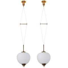 Two Glass and Brass Suspension Pendants by Stilnovo