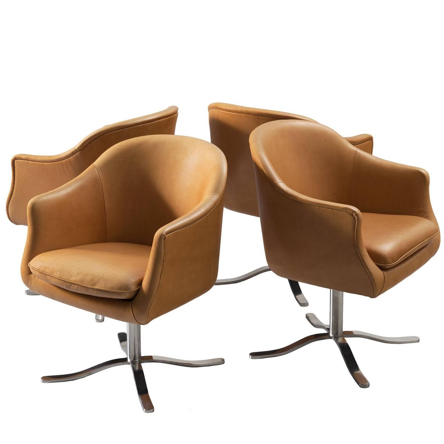 Set of Four Reupholstered Swivel Bucket Chairs in Cognac Leather