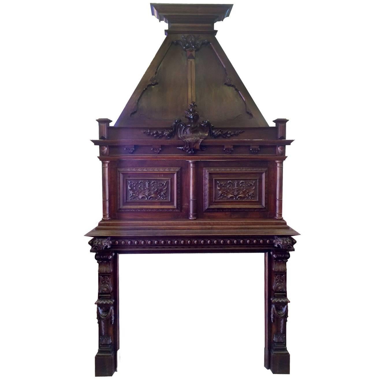 19th Century Carved Walnut French Mantel with Mansard Hood For Sale