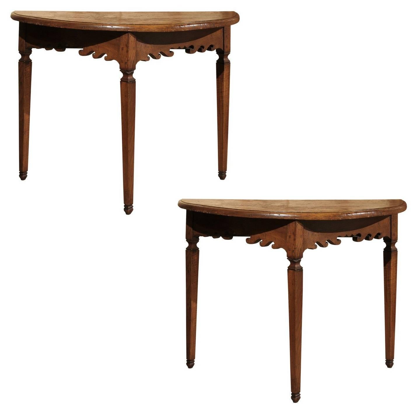 Pair of 19th Century Italian Oak Demilunes with Carved Apron & Tapered Legs