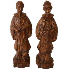 1960s Asian Emperor and Empress Statues with Faux Wood Finish, Pair