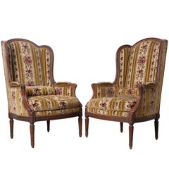Antique Pair of French 19th Century Walnut Transitional Wingback Bergères