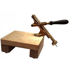 Antique Cork Screw and Cutting Board