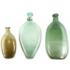 Collection of Three Green Glass Flasks, European, 16th-17th Century