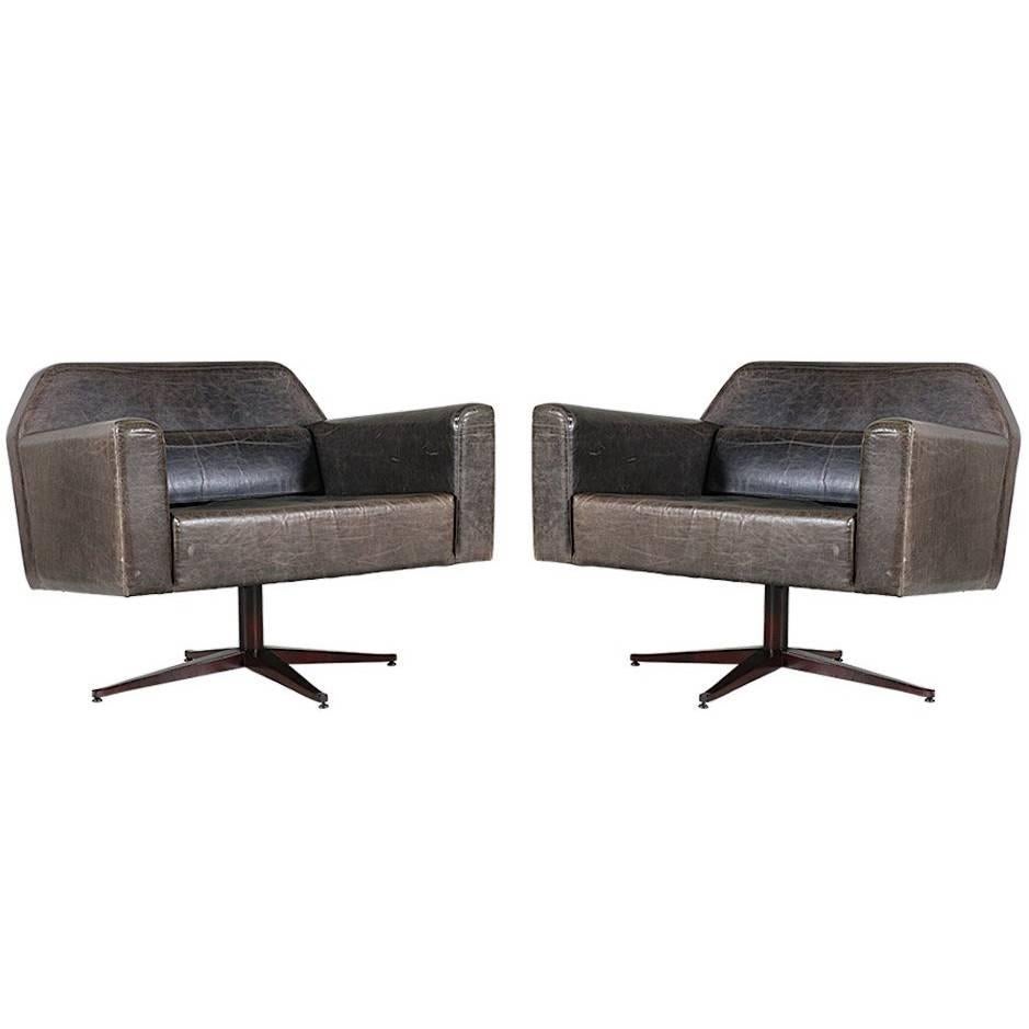 Elephant Grey Leather Swivel Lounge Chairs
