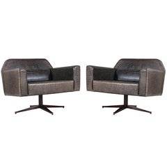 Elephant Grey Leather Swivel Lounge Chairs