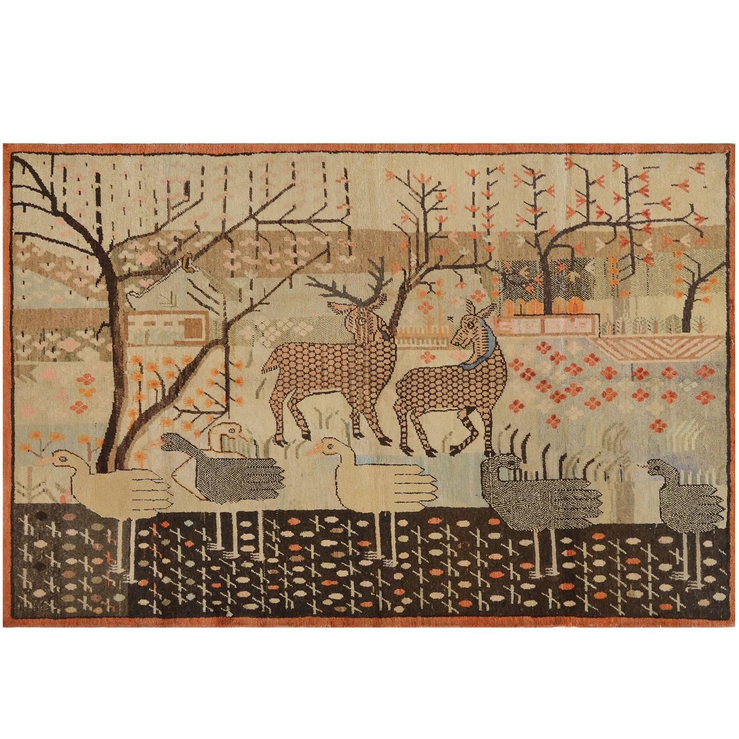 Early 20th Century East Turkestan Khotan Rug with Deer and Geese For Sale