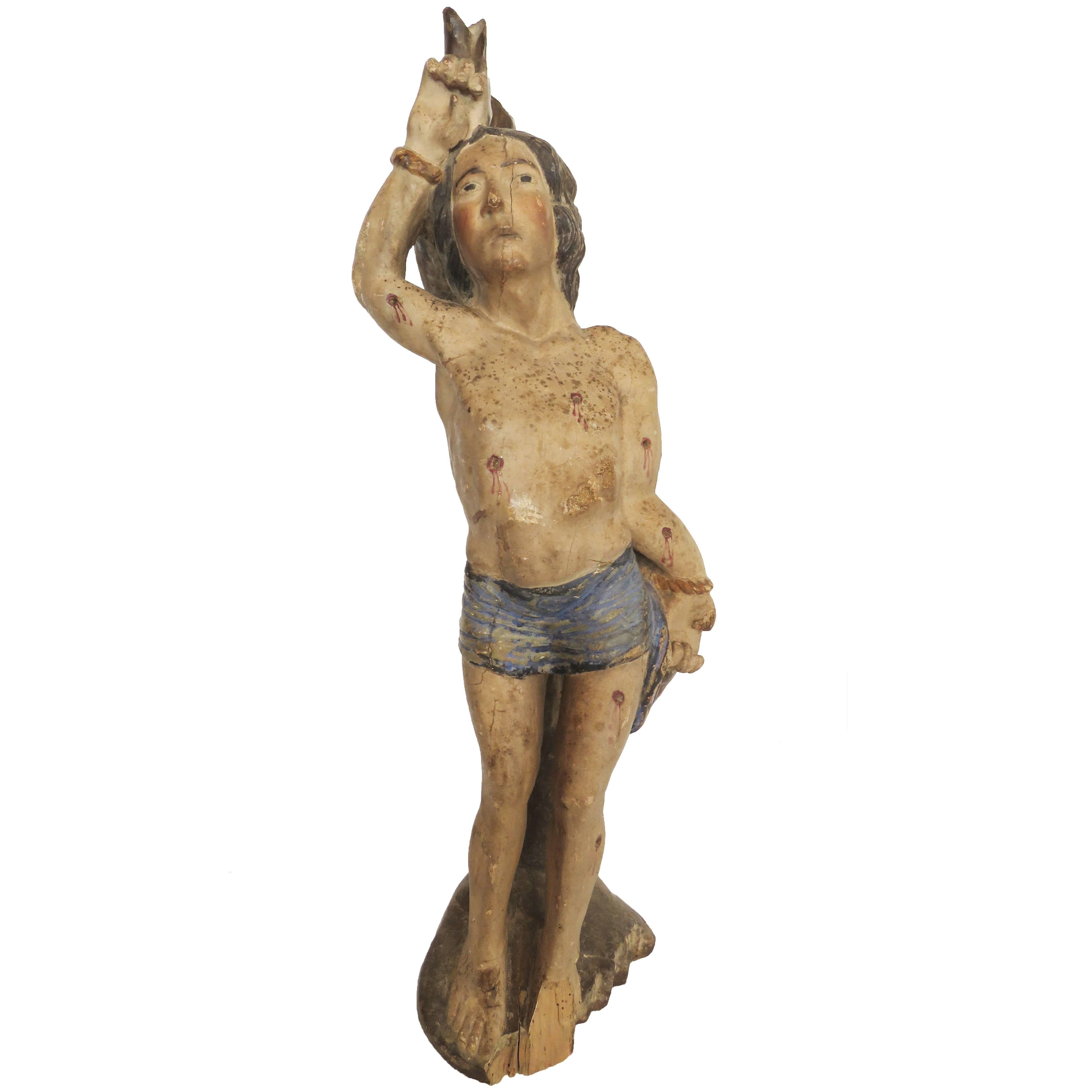 16th Century Polychromed Wooden Saint Sebastian For Sale