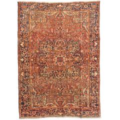 Vintage Persian Heriz Rug with Central Medallion, Rust and Denim Blue Tones