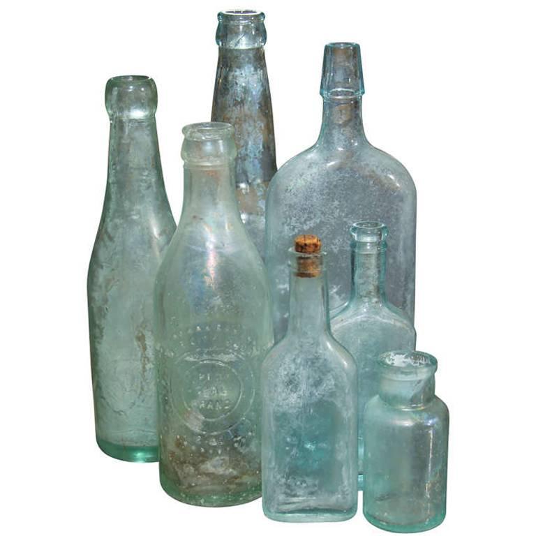 Group of Seven Aqua Bottles