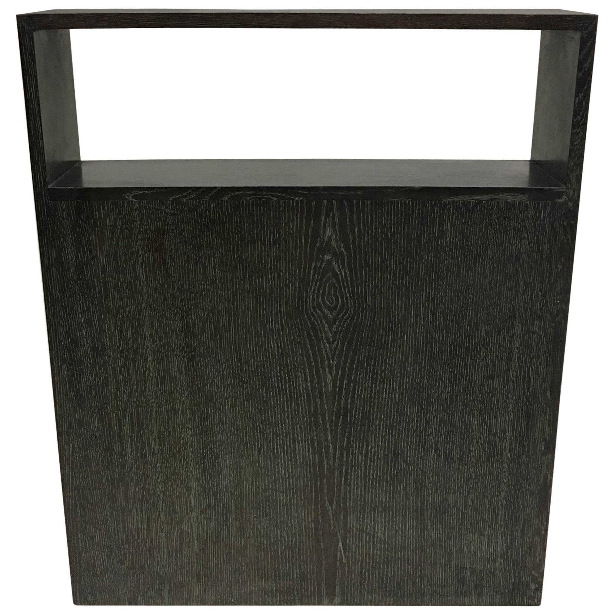 A sleek, narrow profile double level console by Andre Sornay, France, circa 1930 in faint green cerused oak. A sober, Modern statement. 

The piece is ideal for small spaces such as an entrance way, vestibule or hallway. 

Literature: see