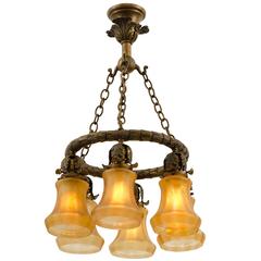 Cast Brass Classical Revival Chandelier with Iridized Amber Shades, circa 1910s