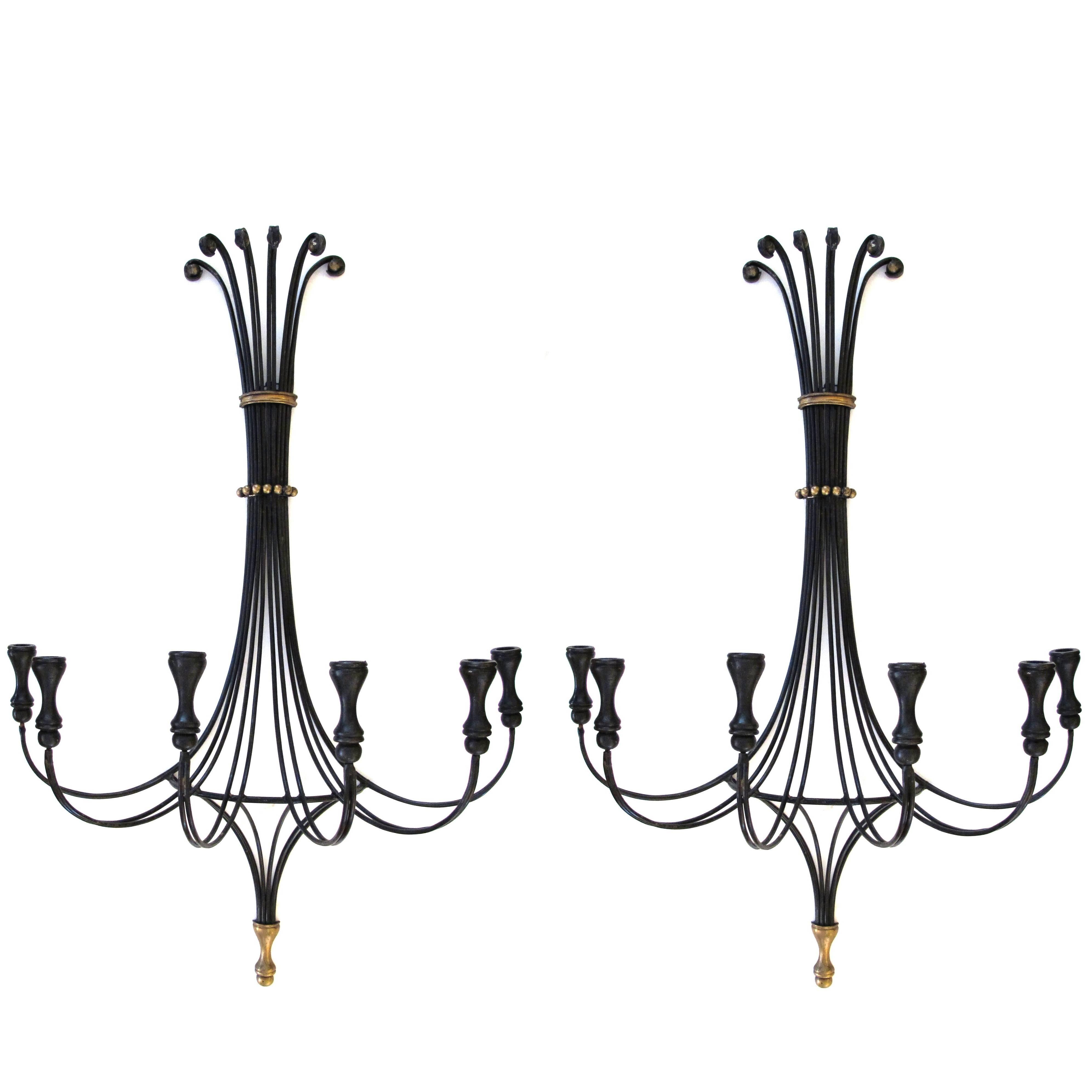 Lyrical Pair of American 1960s Black Painted Wrought Iron Six-Arm Wall Sconces For Sale