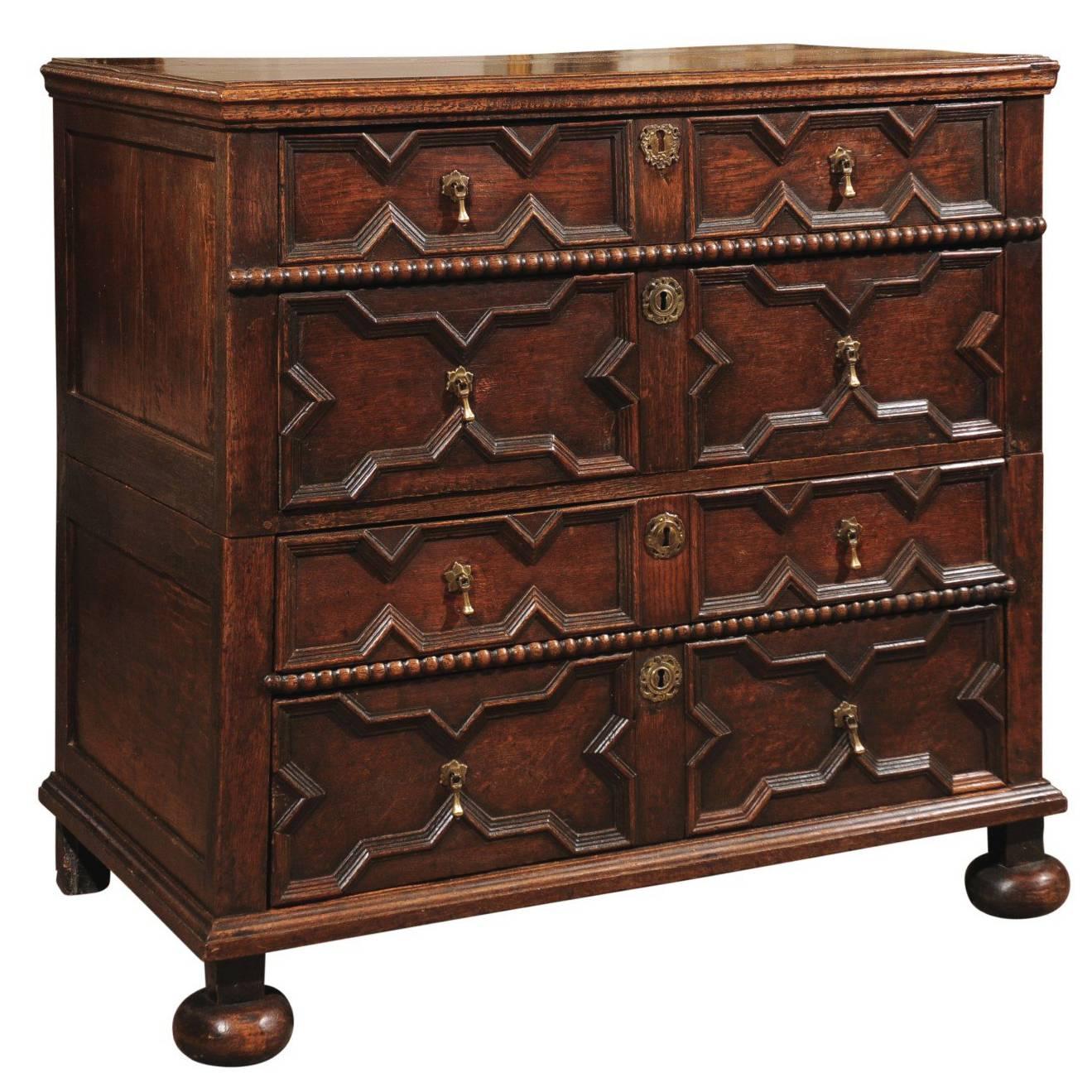 18th Century English Jacobean Style Oak Chest with Four Drawers and Bun Feet